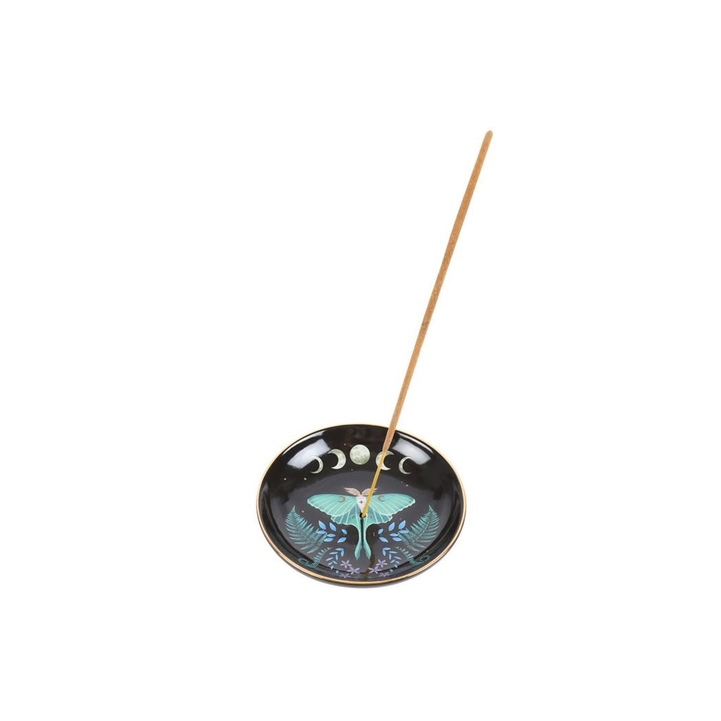 Incense holder with butterfly design and incense stick on a white background