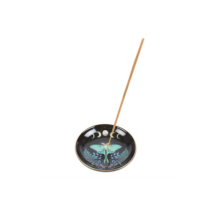 Incense holder with butterfly design and incense stick on a white background