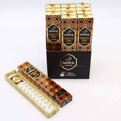 Three Noor Dehn-Al Oud Incense gift boxes with gold geometric pattern and Noor logo.