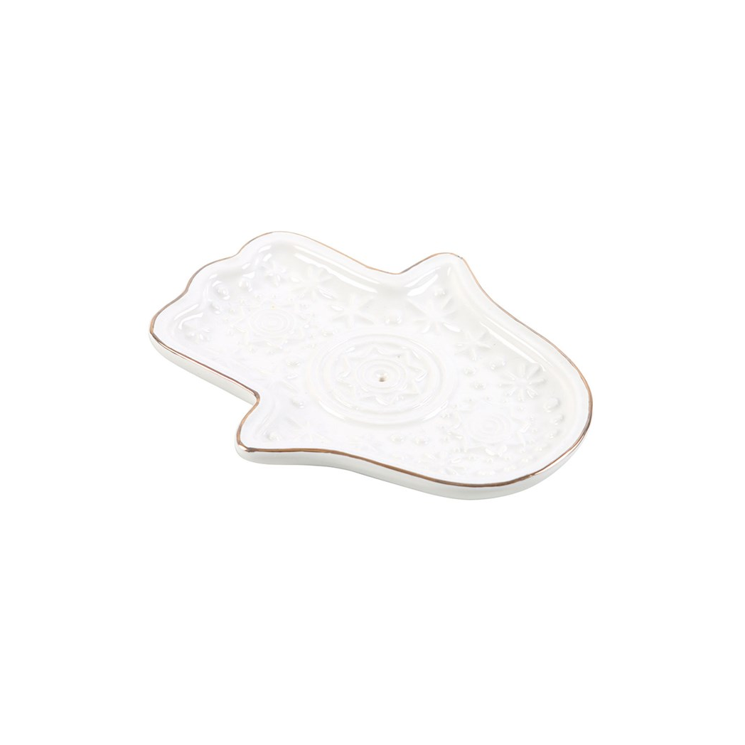 White ceramic hanger-shaped dish on a white background