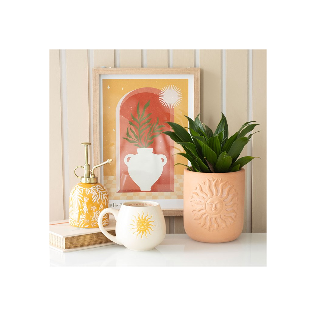 Charming Bohemian Terracotta Plant Pot with Embossed Sun Design